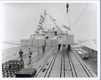 The crane placed a container on the deck of the Ideal X every seven minutes. The ship was loaded in less than eight hours and set sail on her maiden voyage the same day, April 26, 1956.